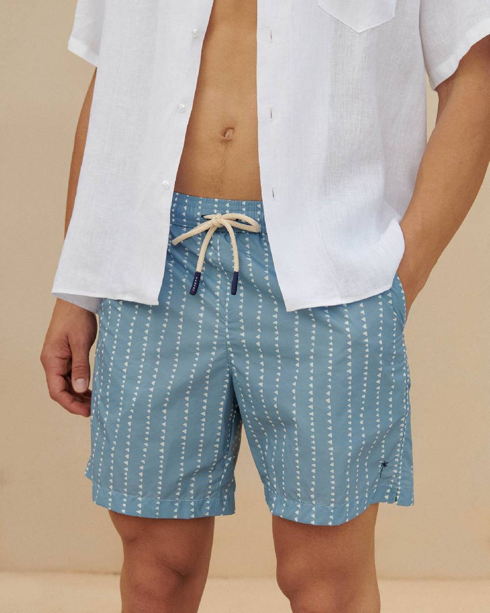 Manebí Printed Swim Shorts - Indigo with White Linear Triangles Offerte