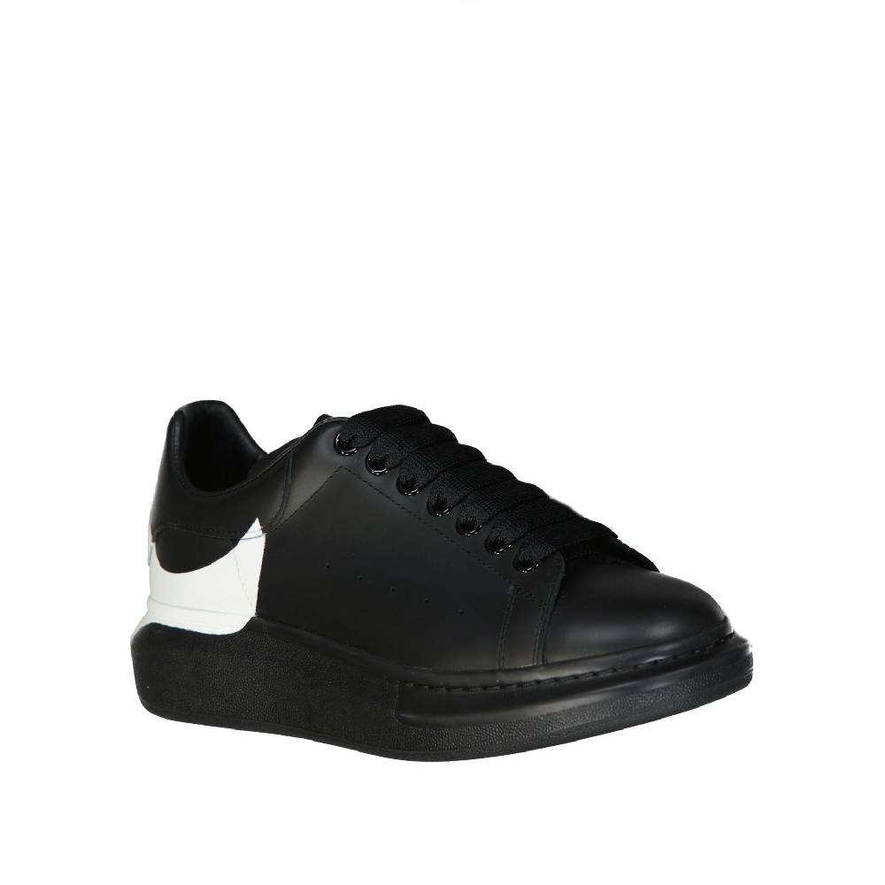 ALEXANDER MCQUEEN  Sneakers Oversize in Pelle Nera Uomo Alexander McQueen Spedizione Gratuita