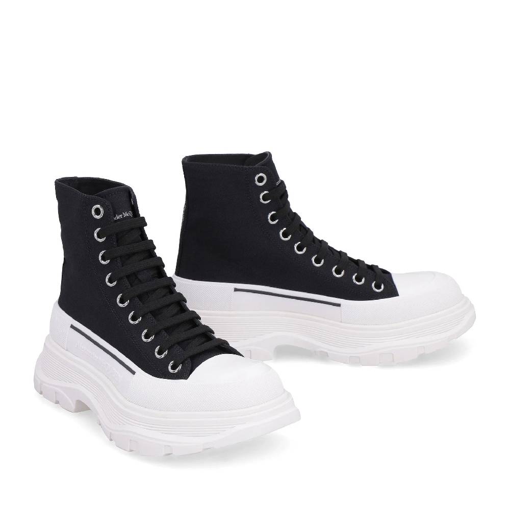 ALEXANDER MCQUEEN  Sneakers Alte in Tela Nere Alexander McQueen Treadslick Novità